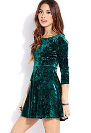 Maybe you would like to learn more about one of these? This Velveteen Dress Would Be Fun With A Gold Sparkly Bow Belt And Black Tights For A Holiday Party Velvet Skater Dress Dresses Green Velvet Dress