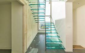 3 flights of stairs sit above each other in a modern london mews property. Glass Stairs Siller Stairs