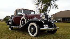 Image result for Garnet Maroon 1931 Oldsmobile
