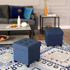 Kick up your feet and rest them on top of one of these ottomans. Navy Blue Storage Ottoman