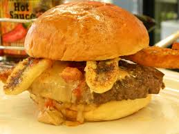 peanut butter monkey pig burger now i know some of you are thinking have you lost your mind but i m telling you folks t grilled bananas crispy bacon burger