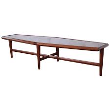 Maybe you would like to learn more about one of these? Drexel Heritage Mid Century Modern Walnut Boat Shaped Coffee Table 1961 At 1stdibs