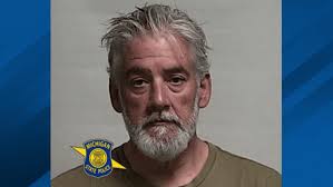 Grayling man charged after allegedly choking woman