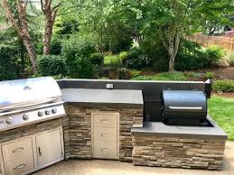 Traeger Smoker Outdoor Kitchen By Sunset Outdoor Living Llc Outdoor Kitchen Backyard Kitchen Outdoor Remodel