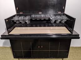 Crafted from the finest woods, metals. Vintage Black Lacquered Drop Front Flip Top Liquor Cabinet Epoch