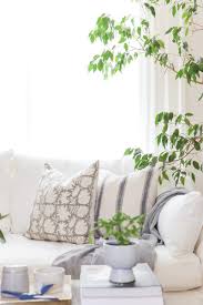 Large mirrors with slimmer frames are best because they bring in light while. 5 Proven Ways To Make A Living Room Look Bigger And Brighter Living Room Refresh Hydrangea Treehouse