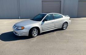 Image result for Dark Meander Green 2004 Pontiac