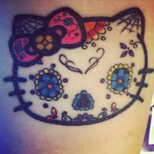 It is so much popular from then and used in every possible way from animated series to cartoons, toys, nail art. Hello Kitty Sugar Skull Tattoo Hello Kitty Sugar Skull Tattoo Hello Kitty Tattoos Sugar Skull Tattoos Cat Tattoo