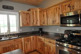 Rustic Hickory Maybe The Dark Counters Really Help The Cabinets Pop Hickory Kitchen Cabinets Hickory Kitchen Best Kitchen Cabinets