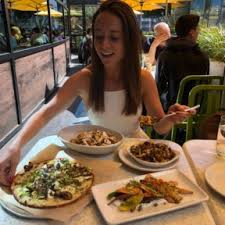 Farro, quinoa, zucchini, asparagus, cherry tomato, snap pea, lemon oregano vinaigrette, cilantro pumpkin seed pesto. True Food Kitchen Gluten Free Follow Me
