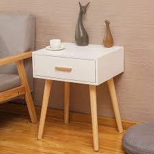 Complete with drawer and shelf, this bedside table not only looks beautiful, it's functional too. Samos Wooden Bedside Table With Drawer White Decornation