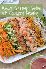 A small green salad with herb vinaigrette dressing. Asian Shrimp Salad With Gochujang Dressing Foxes Love Lemons