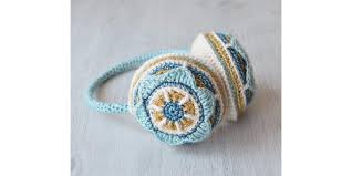 Crocheting a circle that is free of waves and bumps can be tricky. Floral Ear Muffs Scheepjeswol