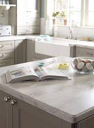 Vintage Inspired Kitchen With Corian Sea Salt From The Martha Stewart Living Collection C Corian Kitchen Countertops Kitchen Countertop Materials Countertops