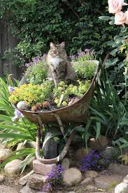 Pin By Maria Fuchs On Homes Upcycle Garden Wheelbarrow Garden Garden Containers