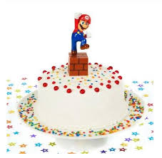 To make the nose, cut the bottom off one of the cupcakes and place it in the center of the round cake. Mama Mia It S Super Mario Party Ideas