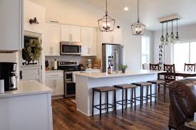 The kitchen now showcases the mix of modern and traditional elements that flows throughout the rest of the home. Open Concept Farmhouse Kitchen Layouts Novocom Top