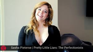 February 7, 2021 'pretty little liars' alum sasha pieterse flaunts ample cleavage in deep plunging denim top nsfw caitlin albers former pretty little liars star sasha pieterse recently gave her 11.2 million instagram followers something to fawn over. Sasha Pieterse Talks Pretty Little Liars The Perfectionists The Gate