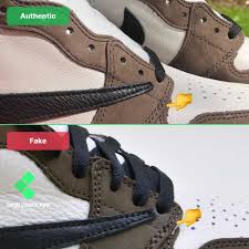 This aj1 comes with a brown upper plus white accents, black nike swoosh, sail midsole, and a brown sole. How To Spot The Fake Vs Real Travis Scott Jordan 1 12 Ways