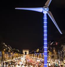 A Wind Turbine Has Been Installed On The Champs Elysees Avenue Ahead Of Cop 21 It Will Provide Electric Dinner In Paris Christmas In Paris Paris New Years Eve