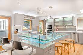 Kitchen islands add practicality to your kitchen space, while a bar counter adds a touch of personality to your home. Contemporary Kitchen Island In California With A Raised Bar And Cast Glass Count Modern Kuche Los Angeles Von Innovate Building Solutions