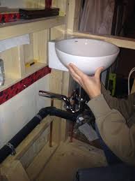 how to install wall mount corner sink