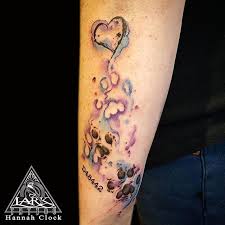 It indicates the love between you and your pet is beyond the infinity. Tattoo Uploaded By Lark Tattoo Watercolor Style Tattoo Of Paw Prints And Heart By Lark Tattoo Artist Hannah Clock Watercolor Watercolortattoo Watercolour Pawprint Heart 312001 Tattoodo