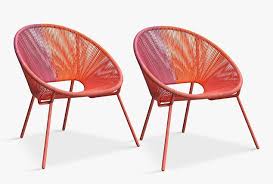 Sleek and contemporary, this rattan garden chair stands on black metal legs. From Dining Sets To Rattan Chairs 8 Garden Furniture Buys To Update And Enjoy Your Outdoor Space Daily Mail Online