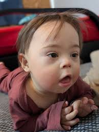 Anyone else's 6 month old know how to sit,half way crawl, and pulling up to  stand. Idk what's going