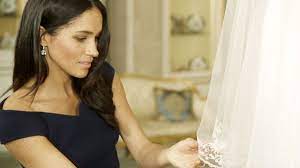 Prince harry and meghan markle emerge from windsor castle on may 19, 2018 after their wedding ceremony. Meghan S First Date Dress Was Her Something Blue Bbc News