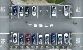 Tesla’s profits slide despite growing revenue as it pivots to robotics and AI