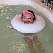 Slapping the water with their hands can get old. What S The Deal With These Funny Floating Babies Houstonia Magazine