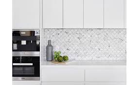 It will look especially pretty in a home with grey walls and gold. Carrera Marble Fan Shaped Fish Scale Tile Backsplash Modern Kitchen