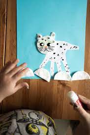 The content is written at three different reading levels for enrichment or remediation. Cute Snow Leopard Handprint Craft For Kids Shelterness