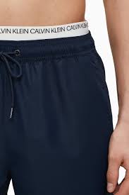Calvin klein in canada offers modern, sophisticated styles for women and men including apparel, handbags, footwear, underwear, fragrance and home furnishings with free shipping available. Calvin Klein Blue Men S Swimwear Short Double Ws Swimming Trunks Differenta Com