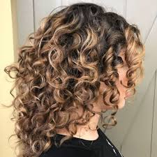 There are many celebrities with medium length curly hair styles that you can get inspiration from. The Best Medium Length Naturally Curly Hairstyles Southern Living
