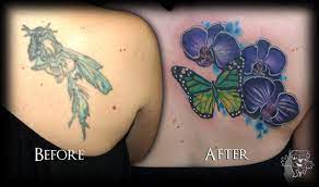 Unique Female Tattoos Cover Up Covering Up A Old Blurry Fairy There Is Talk Of Adding Some More Cover Up Tattoos Orchid Tattoo Butterfly Tattoo Cover Up