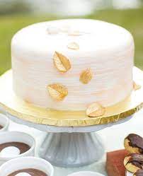 27 Simple Wedding Cakes That Prove Less Really Can Be More Simple Wedding Cake Wedding Cake Gold Leaf Painted Wedding Cake