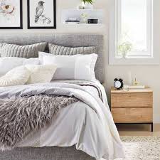 Photo frame wall, wall art, neutral relaxing bedroom, bench, desk, floral pillows. Neutral Modern Bedroom Decor Collection Project 62 Modern Bedroom Minneapolis By Target Home Houzz