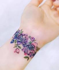 Sunflowers represent health, good luck, and optimism. Flower Wrist Tattoo Wrist Band Tattoo Trendy Tattoos Flower Wrist Tattoos
