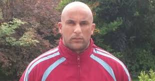 Reinstatement row after footballer denies racist taunts and monkey noises