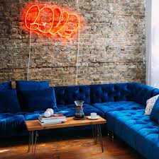 The Interior Define Ms Chesterfield Sofa Upholstered Here In Oxford Blue Mod Velvet Con Modern Farmhouse Living Room Decor Modern Glam Living Room Custom Sofa