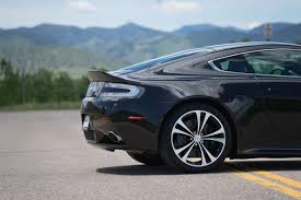 Image result for Jet Black 2011 Aston Martin