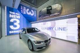 the new bmw flagship in paris and its 3 million digital innovations new bmw car showroom ford ev