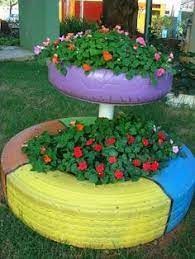 20 fantasticas ideas para decorar tu jardin con objetos reciclados. Jardines Con Llantas