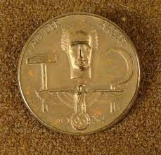 Issued to labour workers in germany; Original Nazi Tag Der Arbeit Medal 1934