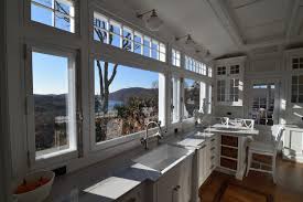 Resurfacing kitchen cabinets means that you retain your original cabinet boxes and existing cabinet layout and simply remove and replace the front layer of your cabinet doors. Braga Woodworks