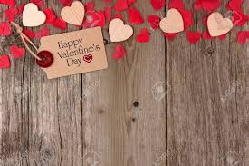 Maybe you would like to learn more about one of these? Happy Valentines Day Gift Tag With Scattered Wooden Hearts And Stock Photo Picture And Royalty Free Image Image 69568393