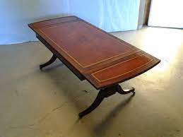 Find out all of the information about the holland & sherry product: Antique Mahogany Coffee Table Heritage Henredon Leather Inlay With Gold Leaf Art Deco Era Hollywood Regency Style With Leaf Mahogany Coffee Table Leather Coffee Table Henredon