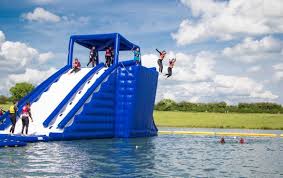 The winner of the race is the first one to reach the finish line and splash in the pool. Aquapark Rutland Water Anglian Water Parks